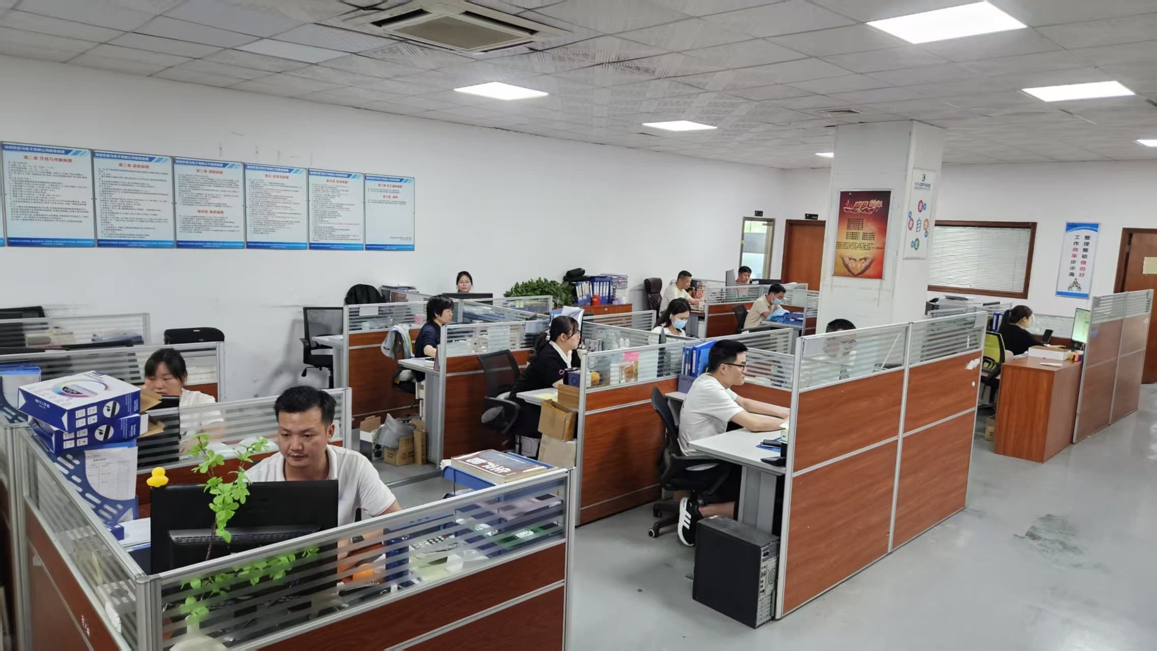 Office workspace with staff present