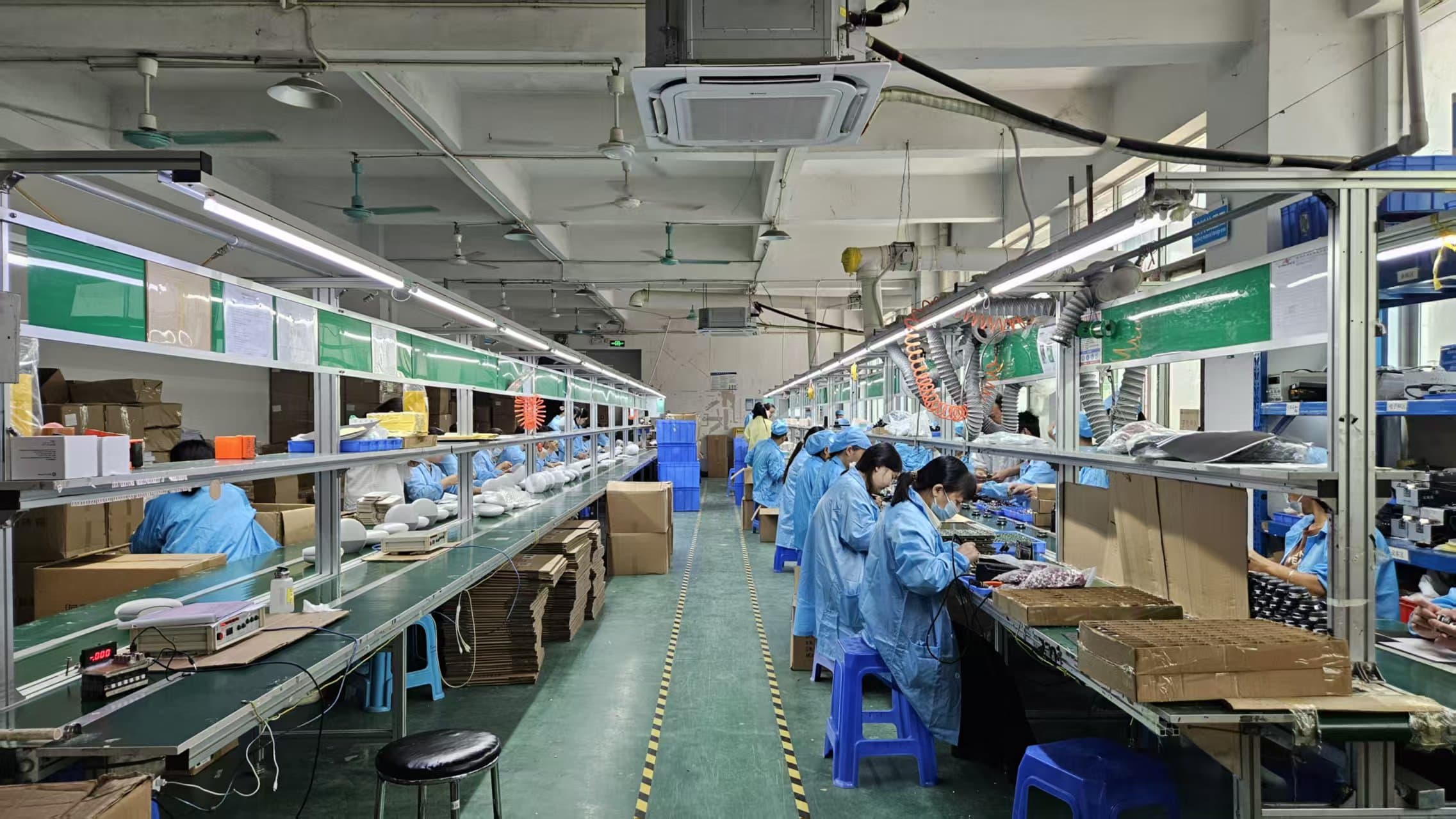 Side view of a production line with assembly work in progress